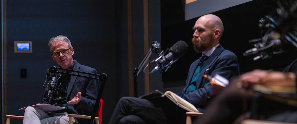 Panelists Professor Mark Kenny and Professor Nicholas Biddle on stage during the Democracy Sausage Live event at ANU in
        Canberra