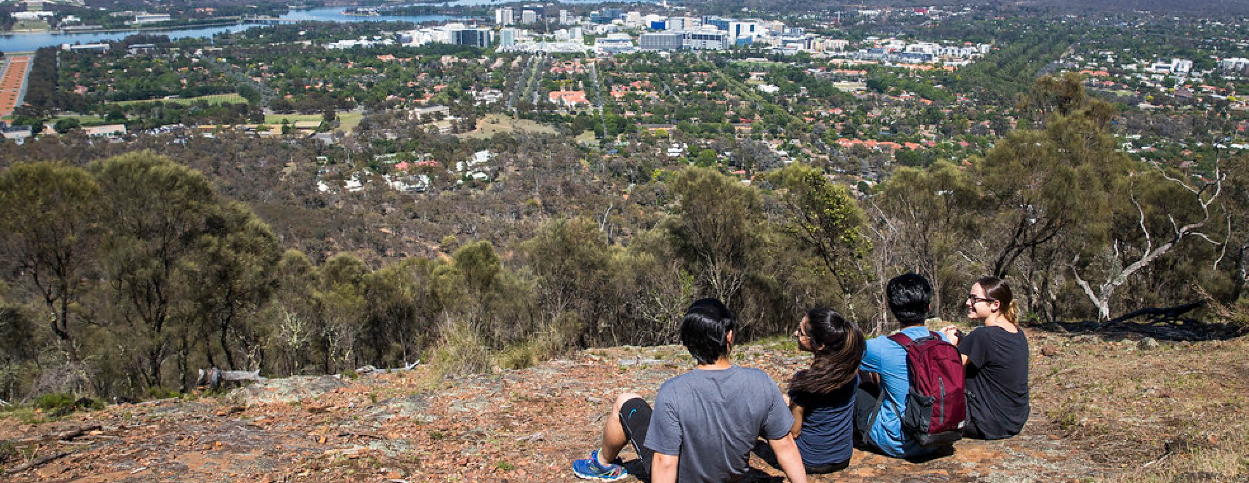 Students enjoy the breathtaking view of Canberra that overlooks the city, Anzac Parade and Parliament House from Mount Ainslie.