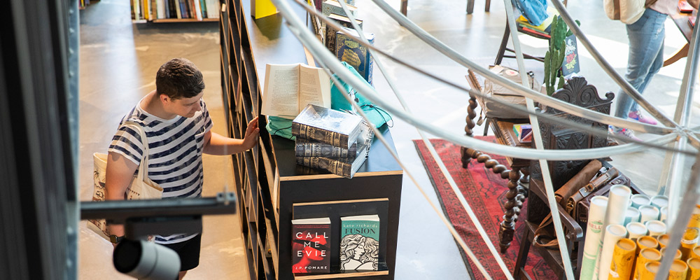 Students peruse books in the Harry Hartog Booksellers store in Kambri.