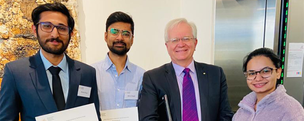 Ketan receives his scholarship from Vice chancellor Prof. Brian Schmidt.