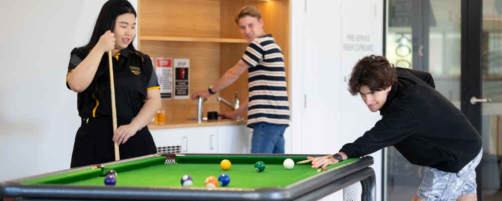 ANU students in the common area of a student residence.