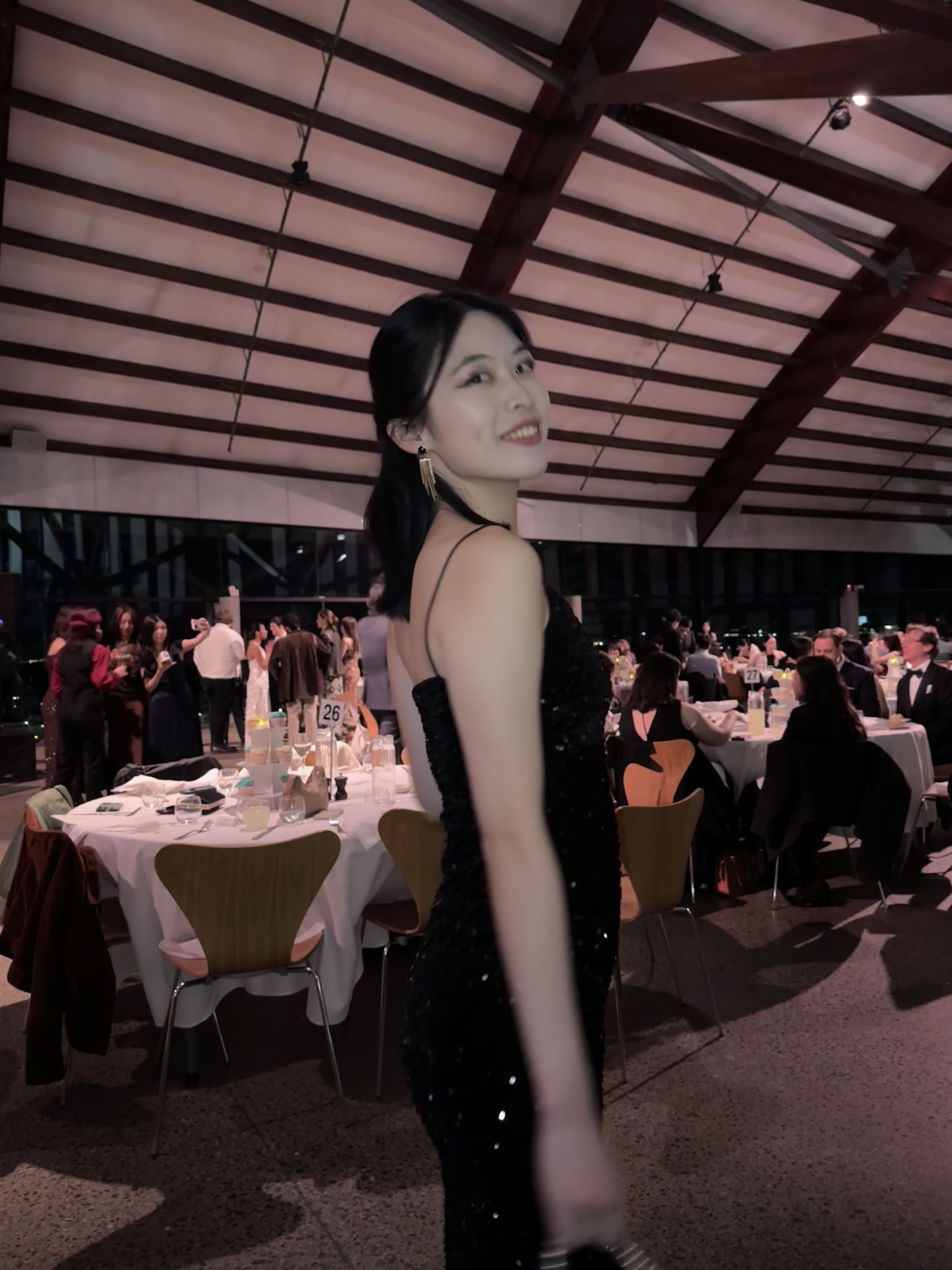Eunice poses for the camera at a gala setting in the interior of the National Arboretum in Canberra.