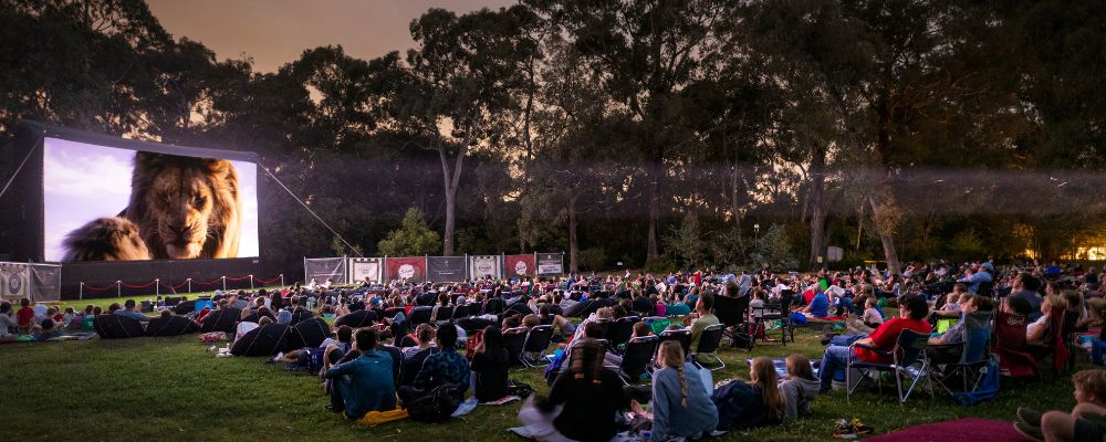 Filmgoers watch a movie under the stars at an outdoor cinema at the Australian National Botanic Gardens in Canberra.